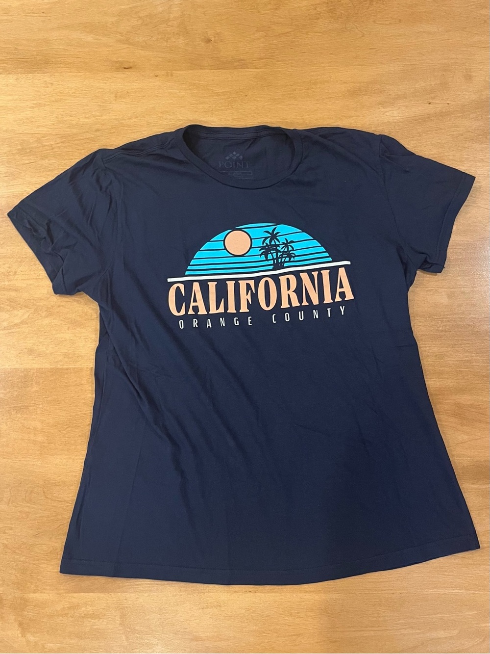 Dark-blue “orange county” graphic t-shirt